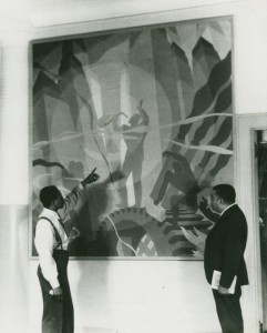 Schomburg Center for Research in Black Culture, Photographs and Prints Division, The New York Public Library. "Artist Aaron Douglas (left) and Schomburg Collection curator Arthur A. Schomburg in front of Douglas's painting "Aspects of Negro Life: Song of the Towers"." The New York Public Library Digital Collections. 1934. 