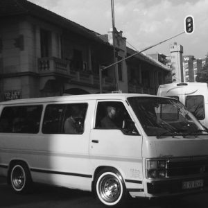 A minibus taxi in a Joburg street intersection.