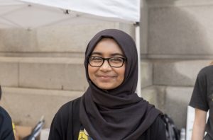 Picture of Sabirah Mahmud, young woman with a hijab and glasses