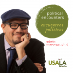 Image of man with classes and cap. He has his chin and head propped up by his left hand. Circle with words political encounters and encuentros políticos written inside the circle. name edwin mayorga, ph.d. and USALAmedia logo